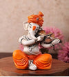 Karigaari India Karigaari Polyresine Ganesha Playing Guitar