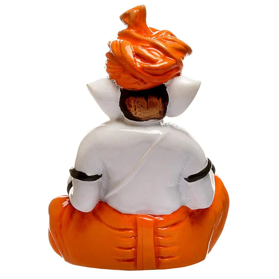 Karigaari India Karigaari Polyresine Orange & White Ganesha Playing Dholak