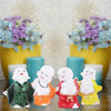 Mariner's Creation Polyresin Baby Laughing Buddha Showpiece Multicolour 4 Pieces