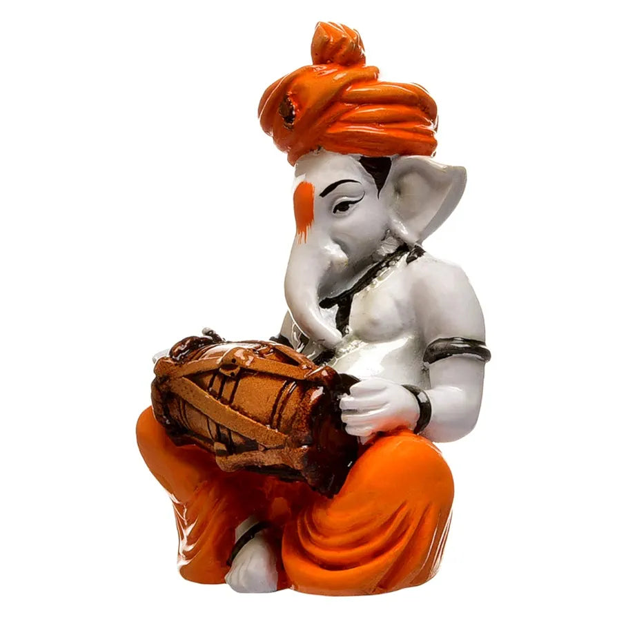 Karigaari India Karigaari Polyresine Orange & White Ganesha Playing Dholak