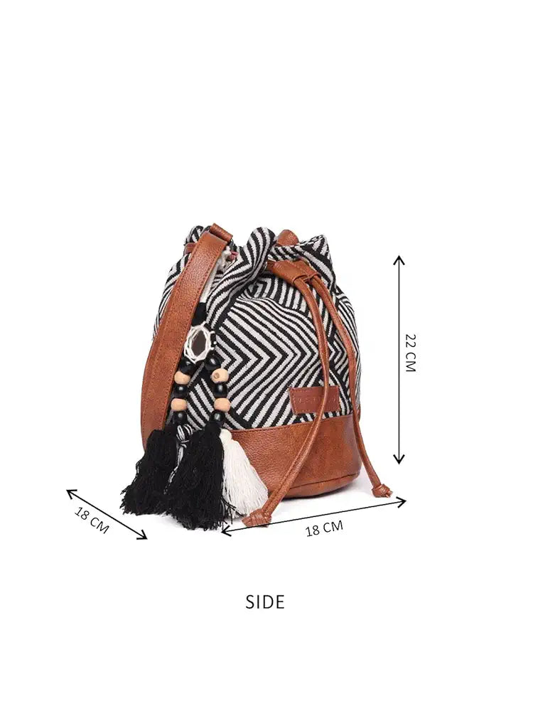 ASTRID Textured Sling Bag With Tassels For Girls 
