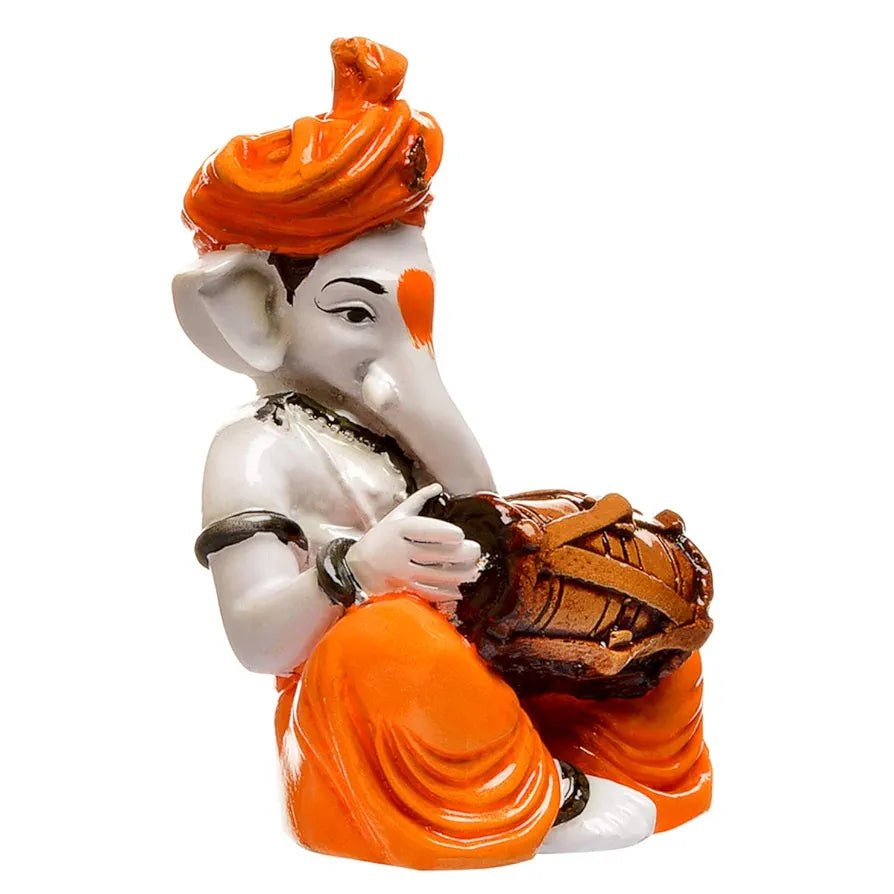 Karigaari India Karigaari Polyresine Orange & White Ganesha Playing Dholak