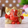 Ecraftindia Golden and Orange Polyresin Lord Ganesha Idol | Sacred Gift for Lord Ganesha Devotees