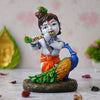 Ecraftindia Colorful Baby Krishna Idol Playing Flute With a Peacock Statue Showpiece