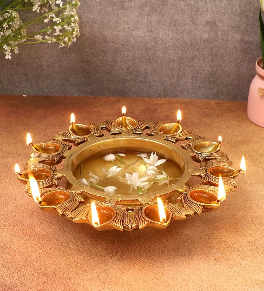 Two Moustaches 9.5 Inches Brass Urli Bowl with Lotus Design 11 Diyas,Urli for Flowers, Urli for Home Decor, Brass Decorative Urli Bowl, Housewarming Gifts, Antique Yellow, Weight - 2.14 Kg,Pack of 1