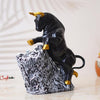 Ecraftindia Black Polyresin Bull Statue With Golden Horns & Climbing on Rock Showpiece