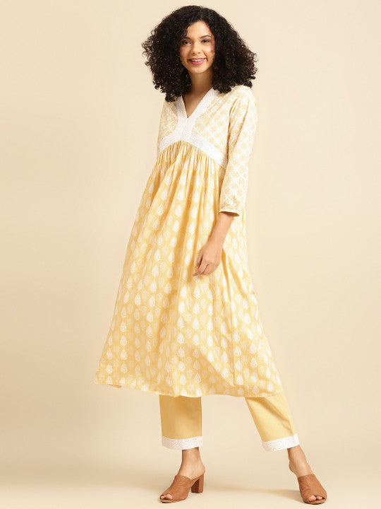 Women Yellow & White Printed Kurta with Trousers